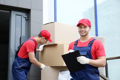 Mover using protective equipment during a Pimlico relocation