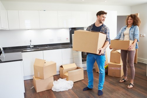 Loading household items into a van in central London