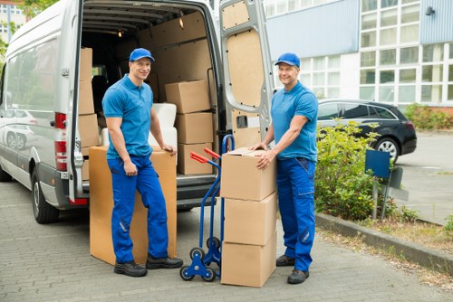 Removal team loading belongings from a central London apartment