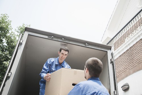 Loading furniture into a removal van in Pimlico